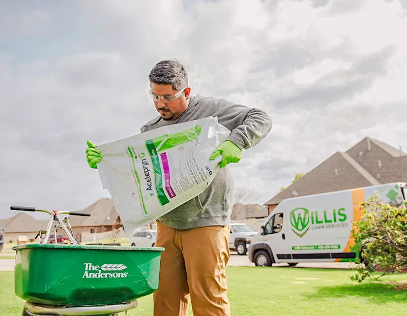 Willis Lawn tech filling seeder with Acelepryn for grub and armyworm treatment