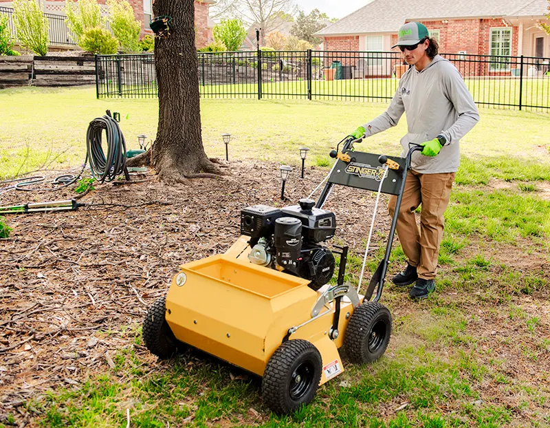 Fescue seeding using power seeder by Willis Lawn Services tech