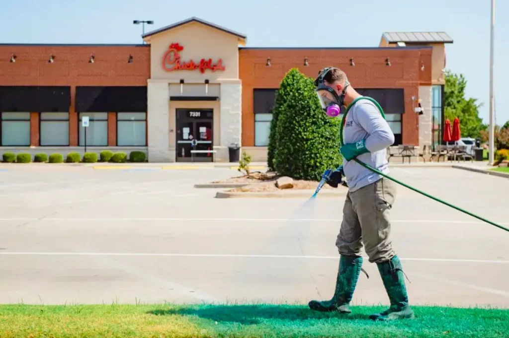 Willis commercial landscaper weed spraying Chick-fil-a