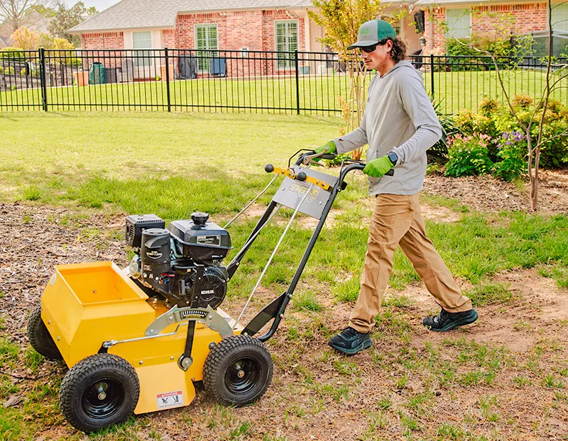 Willis Lawn Services tech fescue seeding yard in Oklahoma City Willis Lawn Services tech fescue seeding yard in Oklahoma City